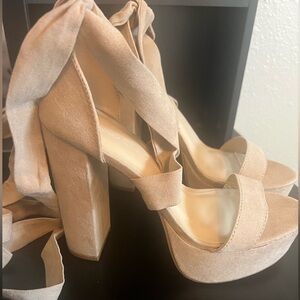 LACE UP BEIGE HEELS. BRAND NEW NEVER WORN!